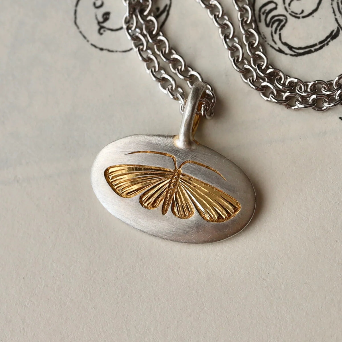 TT House Moth Pendant