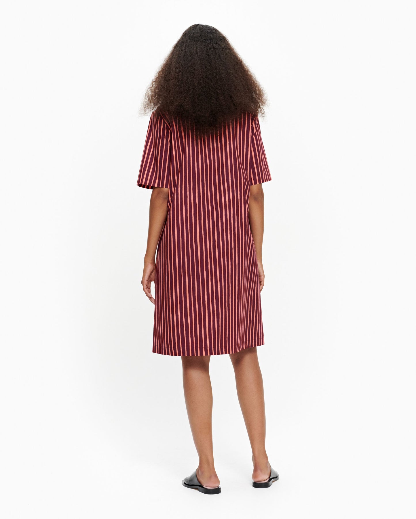 Striped Marimekko short-sleeved Palsta button-up dress is made of cotton in the Piccolo pattern. 